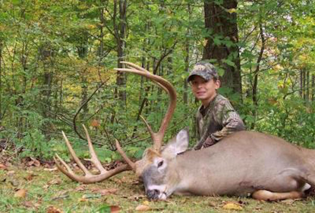 A big buck taken by a young Tristin Scudder. Image courtesy of Tristin Scudder